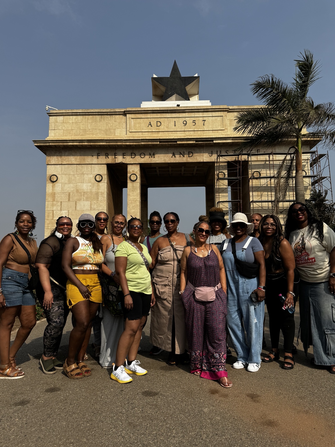 A travel group gathered at Black Star Square in Accra, Ghana
