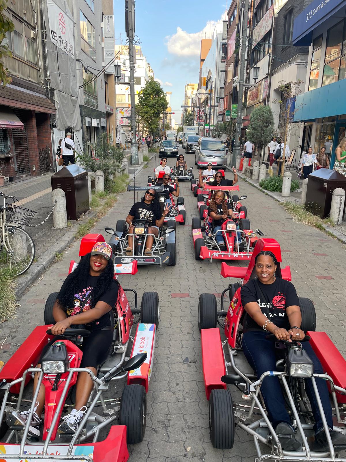 Travelers enjoying a street-kart experience in Japan